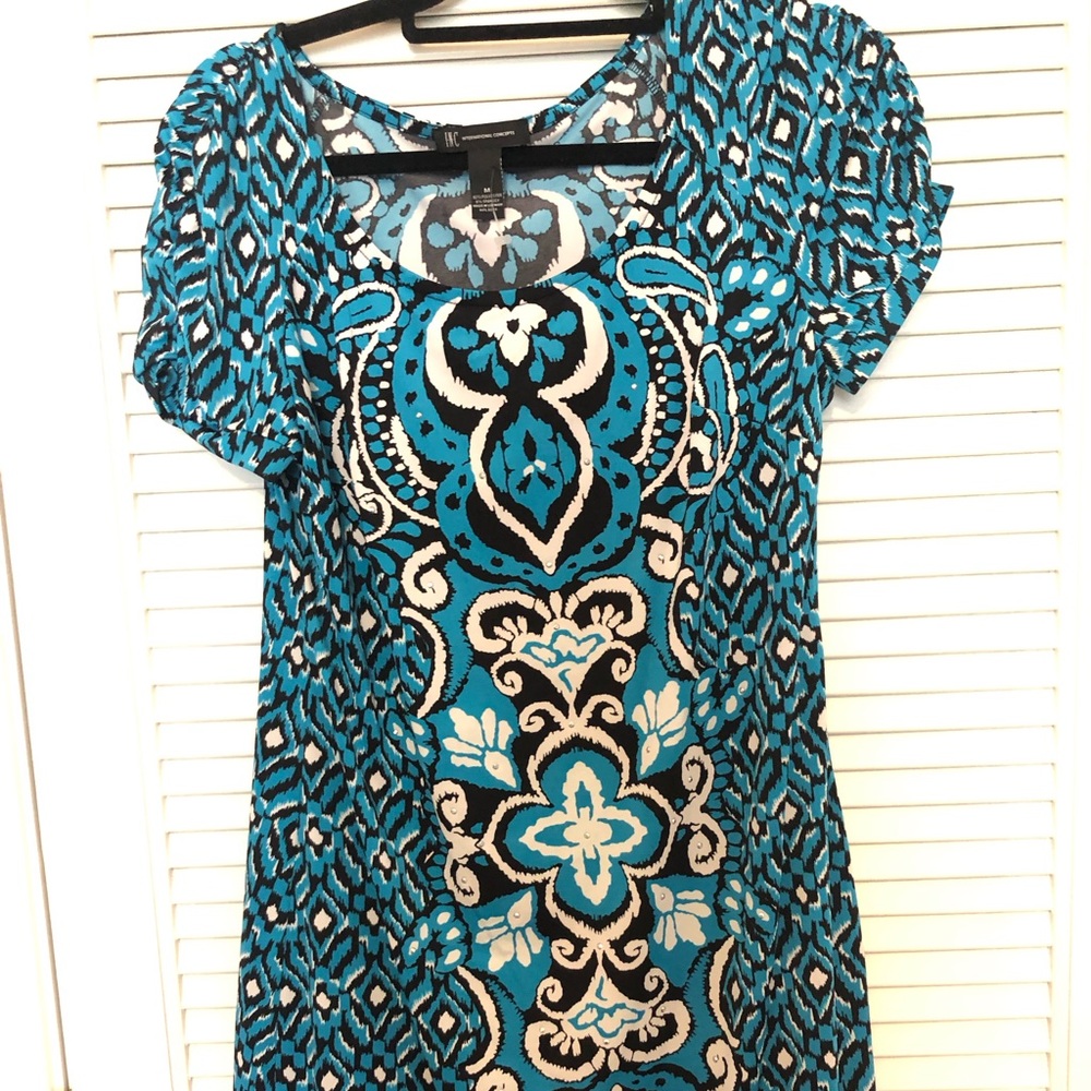 INC dress blue, black and white with small silver stud accents. Pullover.